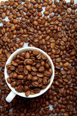 Coffee Beans background with white cup
