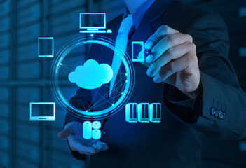 Businessman working with a Cloud Computing diagram on the new co