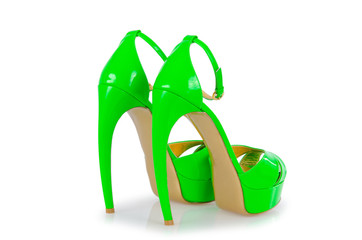 Woman green shoes isolated on white