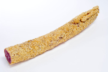 fuet, spanish sausage, coated with onion
