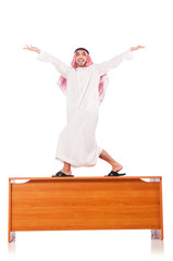 Arab man sitting at his desk