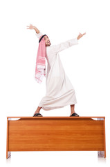 Arab man sitting at his desk