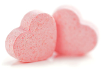 Sweet hearts shaped pink Sugar Pills. Soft Focus.