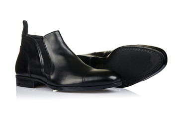 Fashion concept with male shoes on white