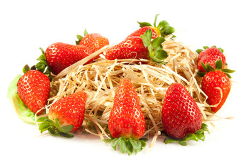 Strawberries with leaves. Isolated on a white background.