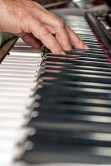 Close up of a piano being played