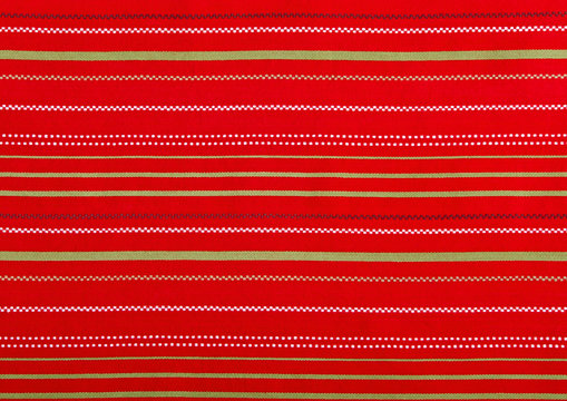 Colorful red textile background with stripes