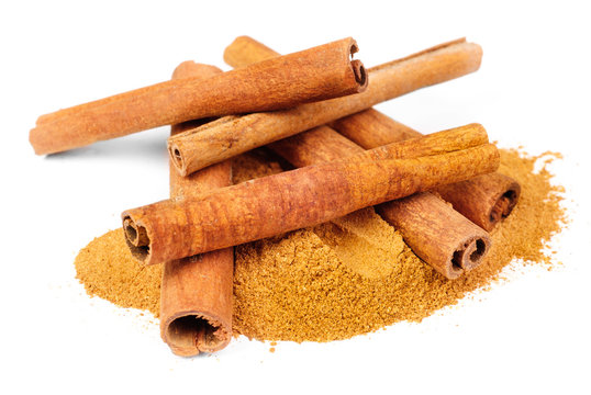 Cinnamon - sticks and powder  isolated on white