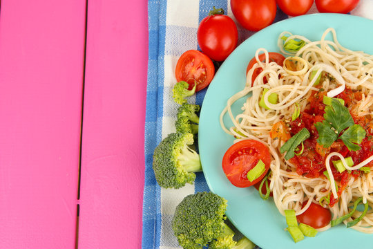 Tasty spaghetti with sauce and vegetables
