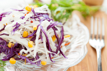 fresh cabbage salad and tinned corn