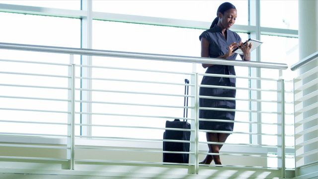 African American businesswoman on wireless tablet