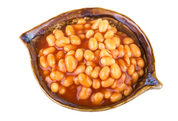 Marinated haricot beans in tomato sauce with shallots on a plate