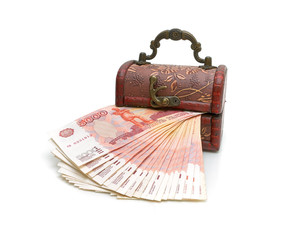 money in a box on a white background close-up