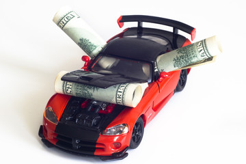 спортивный автомобиль и деньги