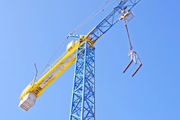 crane on a construction site for the lifting of loads