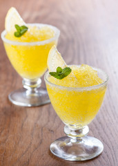 Lemon slushie cups decorated with mint