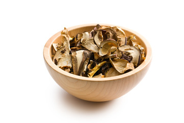 dried mushrooms in wooden bowl
