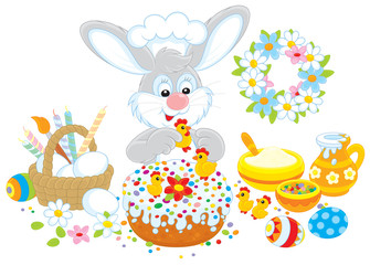 Easter bunny decorates a fancy cake