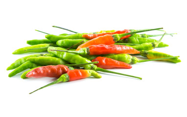 Red and green chili on white background