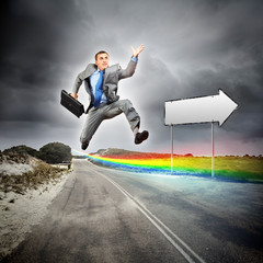 Businessman running on the road