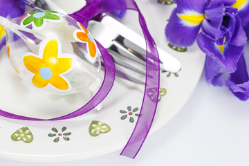 Place setting for Easter with egg and irises