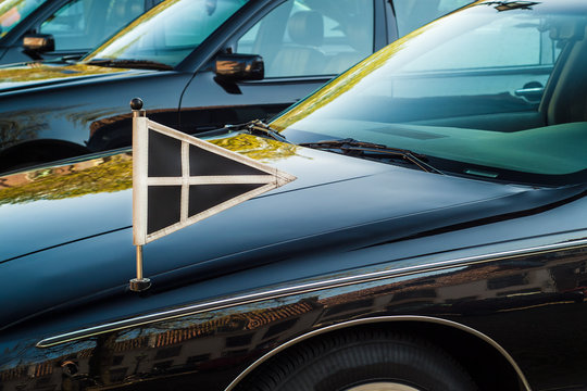 Official flag on a Dutch funeral car