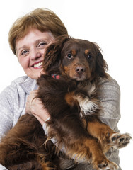 happy senior woman with her dog