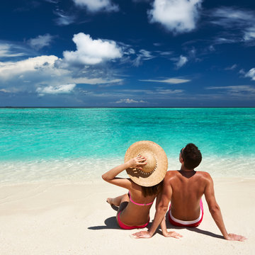 Couple On A Beach At Maldives