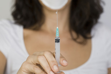 Krankenschwester mit Spritze