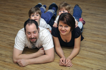 Happy family smiling at home