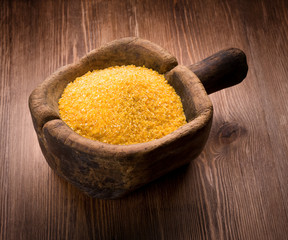 corn grits on wooden