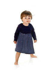 Cute baby girl standing up