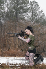Fototapeta premium Woman with Assault Rifle
