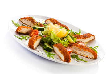 Fried chicken breast and vegetables