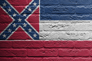 Brick wall with a painting of a flag, Mississippi
