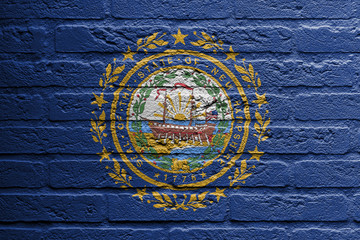 Brick wall with a painting of a flag, New Hampshire