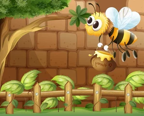 Foto op Plexiglas Een bij die een honing binnen het hek houdt © GraphicsRF
