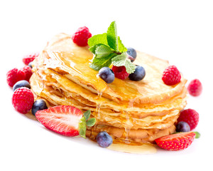 Pancake with Berries. Pancakes Stack over White