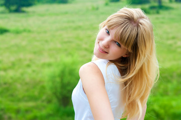 Naklejka premium The girl in a white sundress