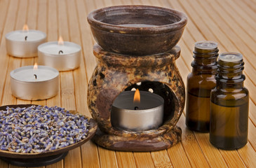 Aromatherapy lamp with oils and dried lavender