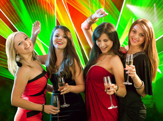 Stylish women toasting with champagne