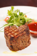 Grilled steak with sauce