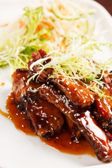 grilled ribs with salad