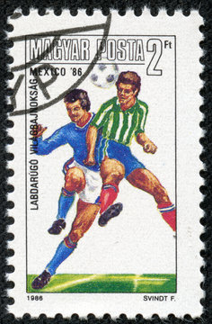 stamp printed in Hungary, shows football players