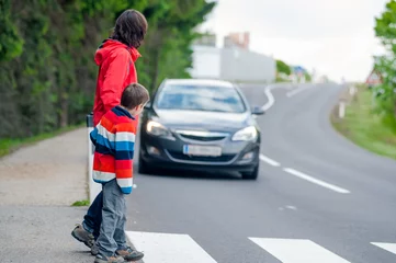 Car stopped for pedestrian © Dieter Hawlan