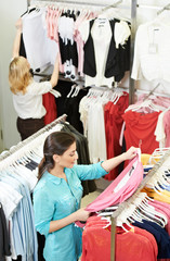 Young woman at apparel shopping