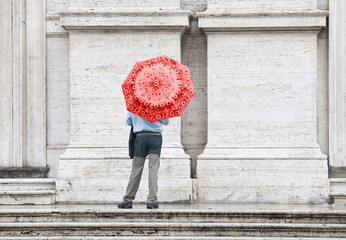 Naklejka premium people in the rain on the street Italy Roma