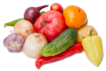 Heap fresh vegetables on white