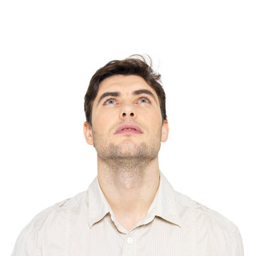 Portrait of young man looking up Stock Photo | Adobe Stock