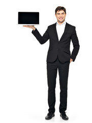 businessman holds on palm the opened  laptop